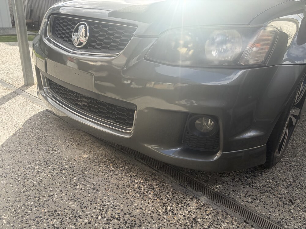 Holden front bumper after colour-matched mobile paint repair in Brisbane